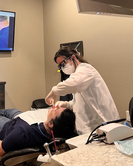 A Valley Family Dental clinician treating a patient in the operatory